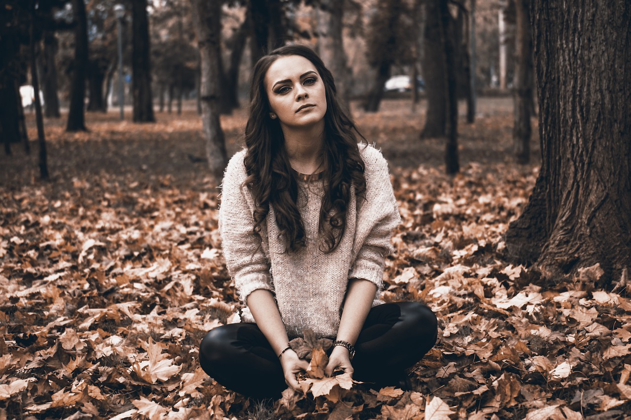 A lone teen sits in a forest with a concerned look. Therapy for teens in South Jersey can offer support. Learn more about therapy for teens in Mickleton, NJ and other services by contacting a therapist in South Jersey today! 08085