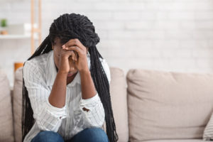 A teen sits on a couch as she hangs her head with an upset expression. Therapy for teens in Swedesboro, NJ can provide support with online therapy for teens in New Jersey. Contact a teenage therapist in Mullica Hill, NJ to learn about therapy for teens in Pennsville, NJ today! 08085