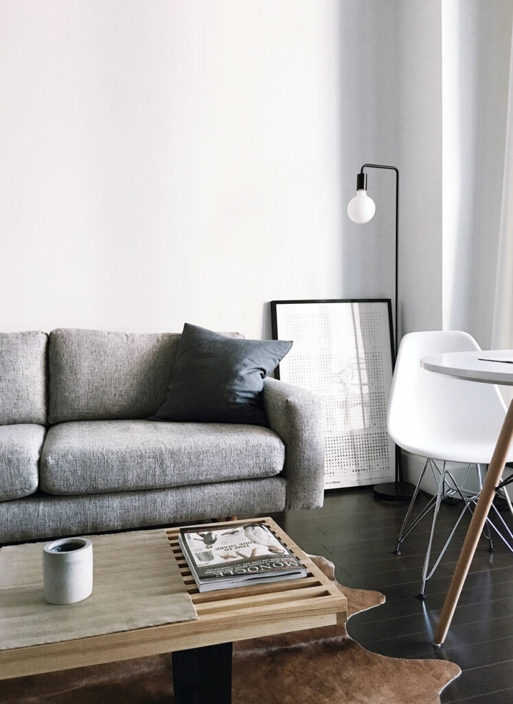 a living room with a couch and a table