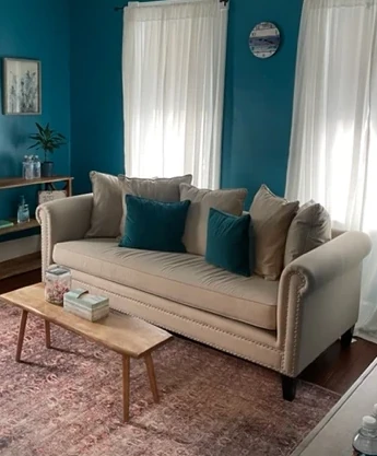 a living room with a couch and a coffee table