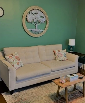 a living room with a couch and a coffee table