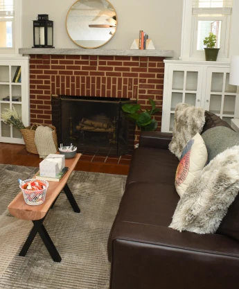 a fireplace with a blanket on top of it